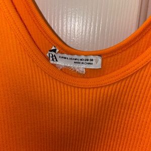 Orange ribbed bodysuit